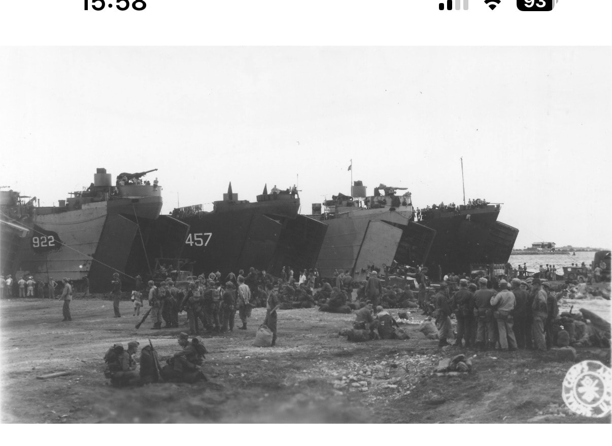 USS LST-457 beached, Pacific Theater — hull number 457 visible on the bow