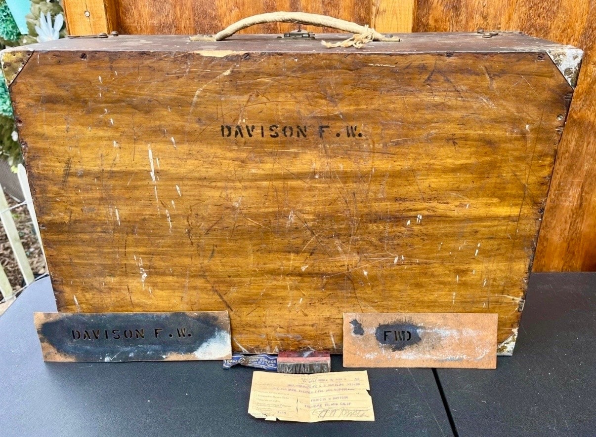 The Davison Navy footlocker — weathered wood and stenciled letters