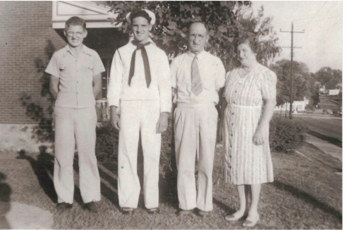 Left to right: Charles Vielhauer, George Edward Vielhauer Jr. in Navy uniform, George Vielhauer Sr., and Ruth Vielhauer